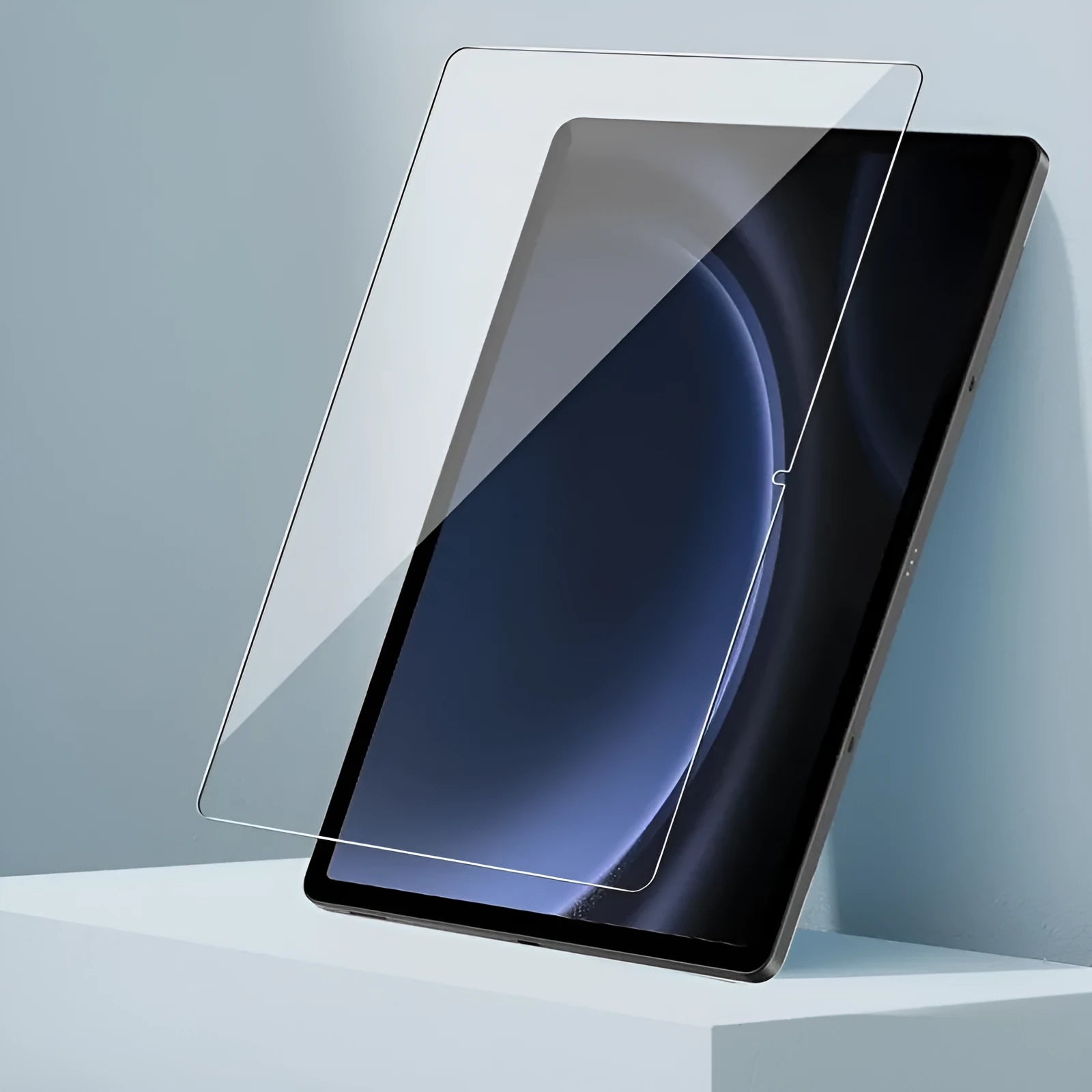Samsung Galaxy tablet with tempered glass screen protector showing edge detail and anti-fingerprint surface
