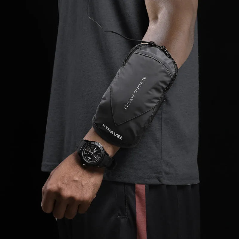Lightweight reflective running arm bag with adjustable strap, shown in black colour.