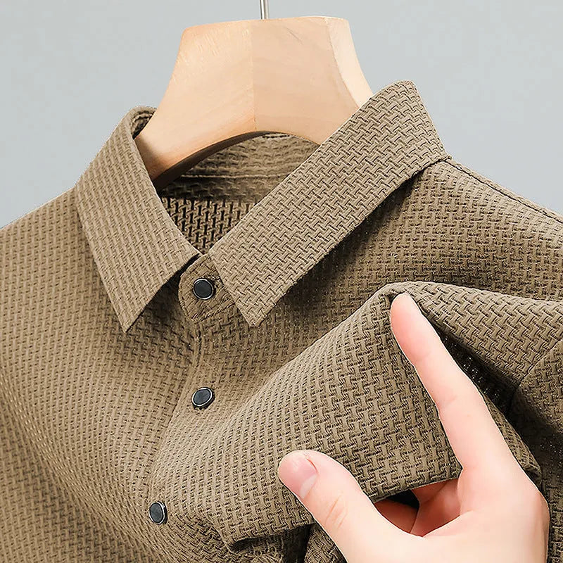 Business casual asymmetric nylon top in khaki on white background