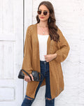 Women's loose-fit acrylic sweater coat in a solid colour, shown in light grey.
