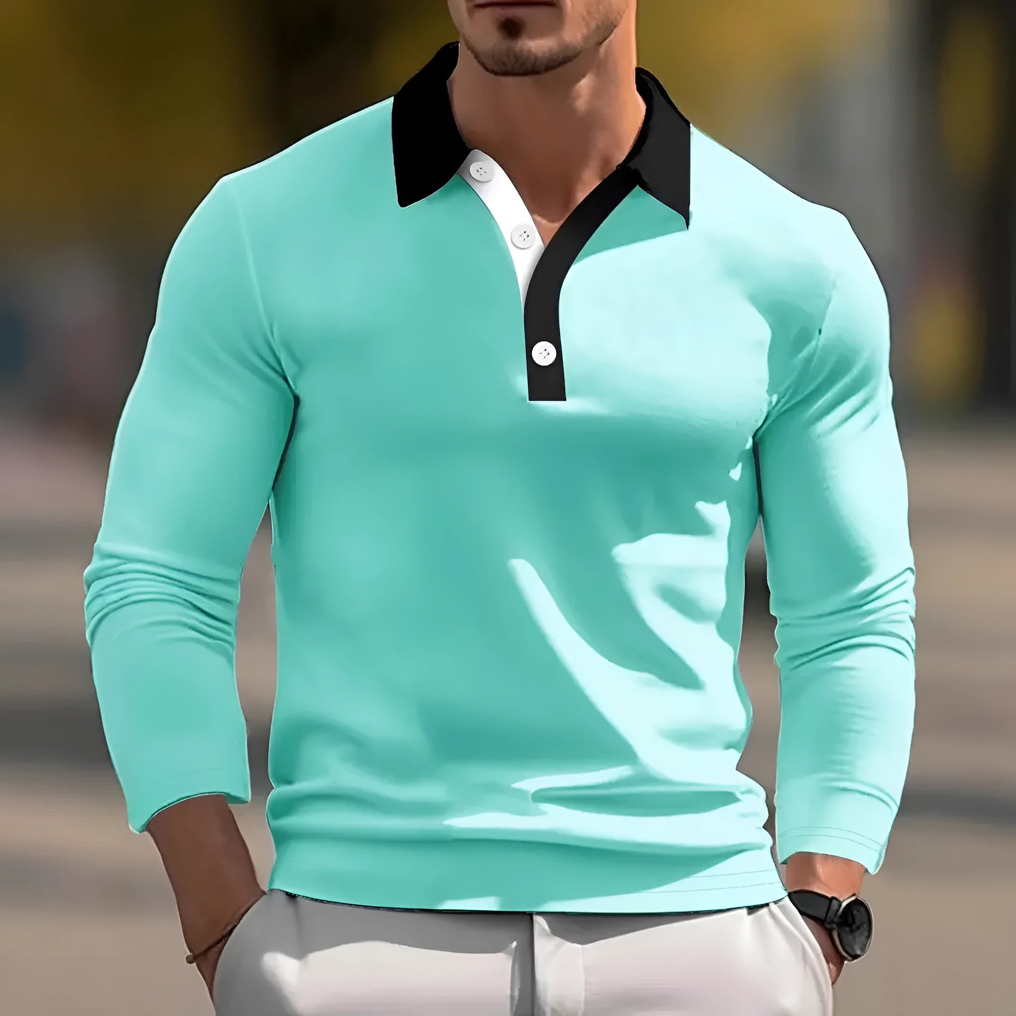Men's long sleeve retro polo shirt with button-up front in a loose fit on a model.