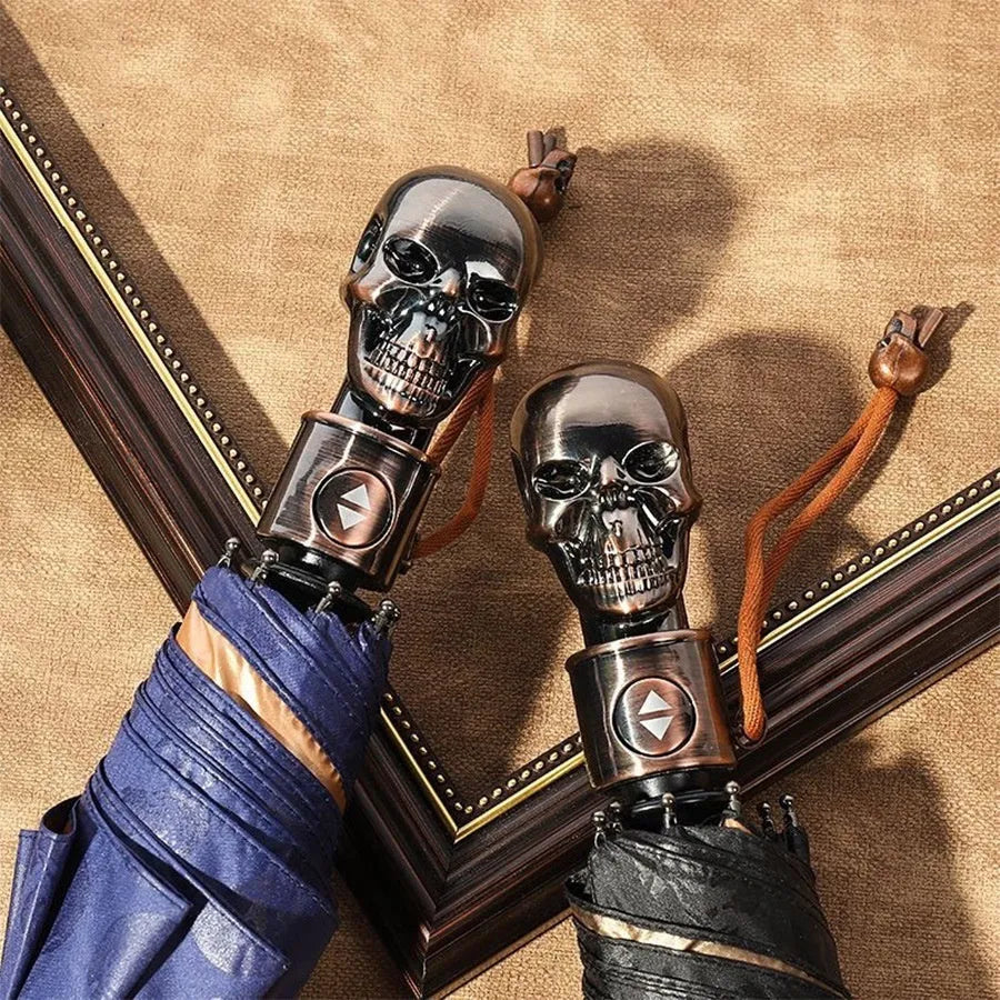 Three-fold automatic skull umbrella with black gold capsules colour, 100cm diameter, and steel handle