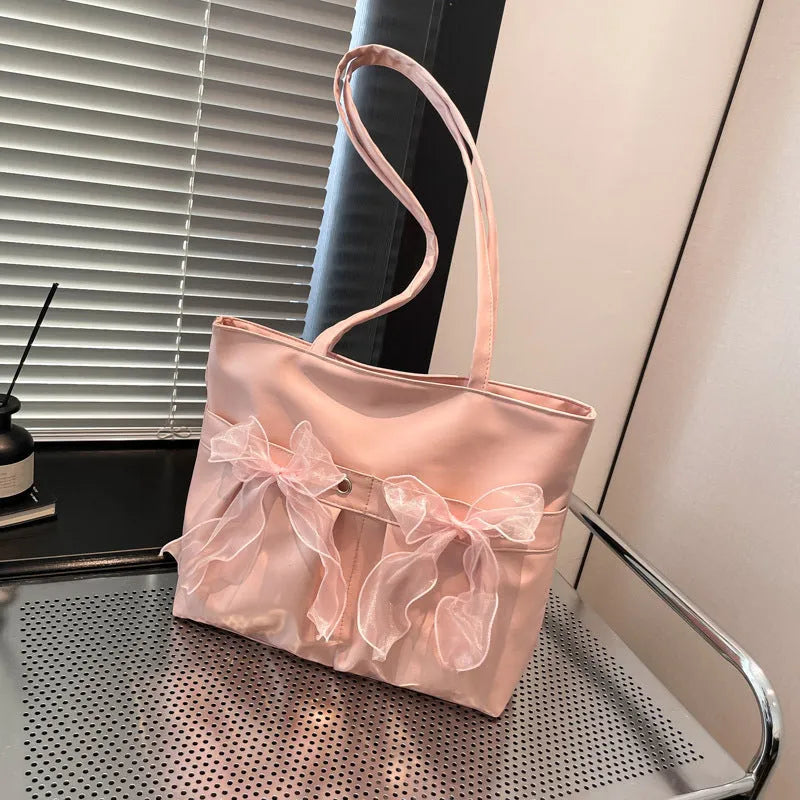College style bow tote bag in black with large capacity and double shoulder straps