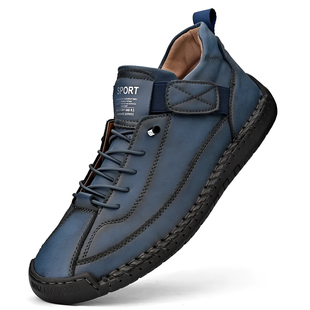 Men's mid-top Martin boots in black with tooling stitching detail and elastic band side entry