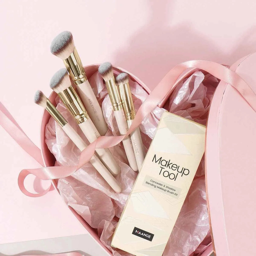 Apricot coloured MAANGE five-piece synthetic makeup brush set with angled blush brush.