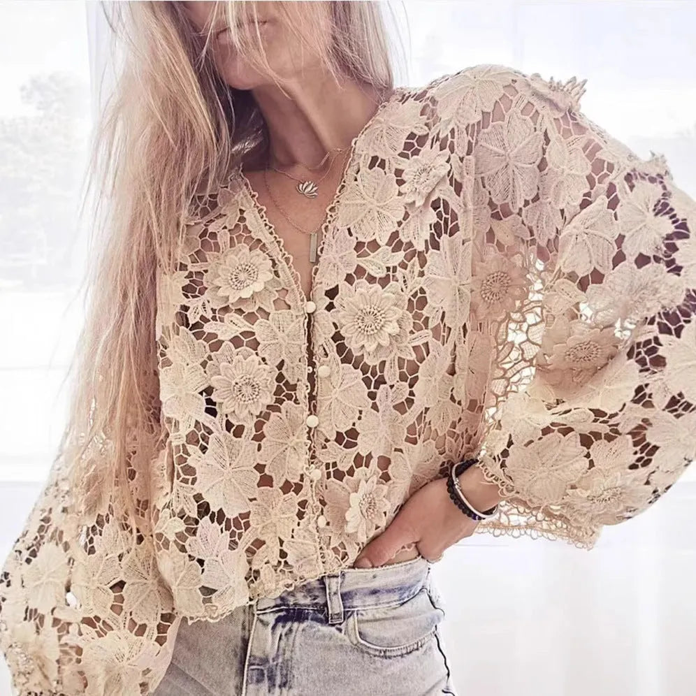 Loose V-neck cardigan with a 3D lace flower decoration in white.