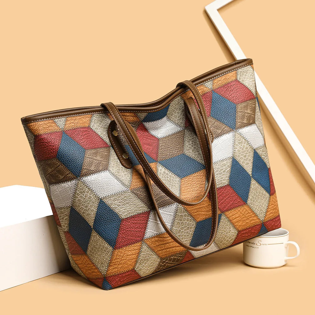 Women's large capacity PVC shoulder handbag in blue brown colour with sandwich pocket organisation