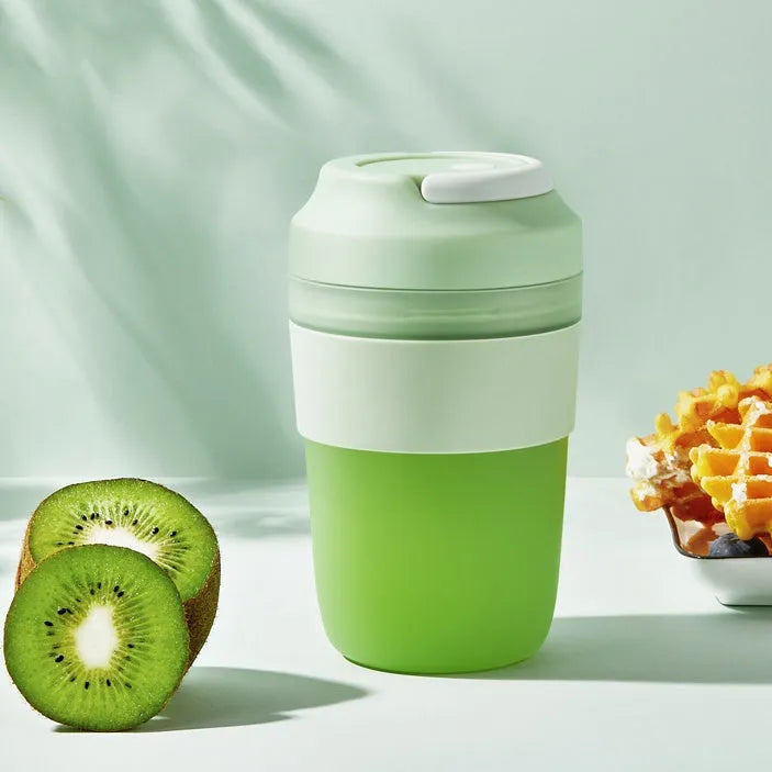 Grape purple portable rechargeable blender cup with lid, 400ml capacity, shown with USB cable.