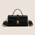 Cambridge-style leather messenger bag in clamshell design with lock detail and internal compartments