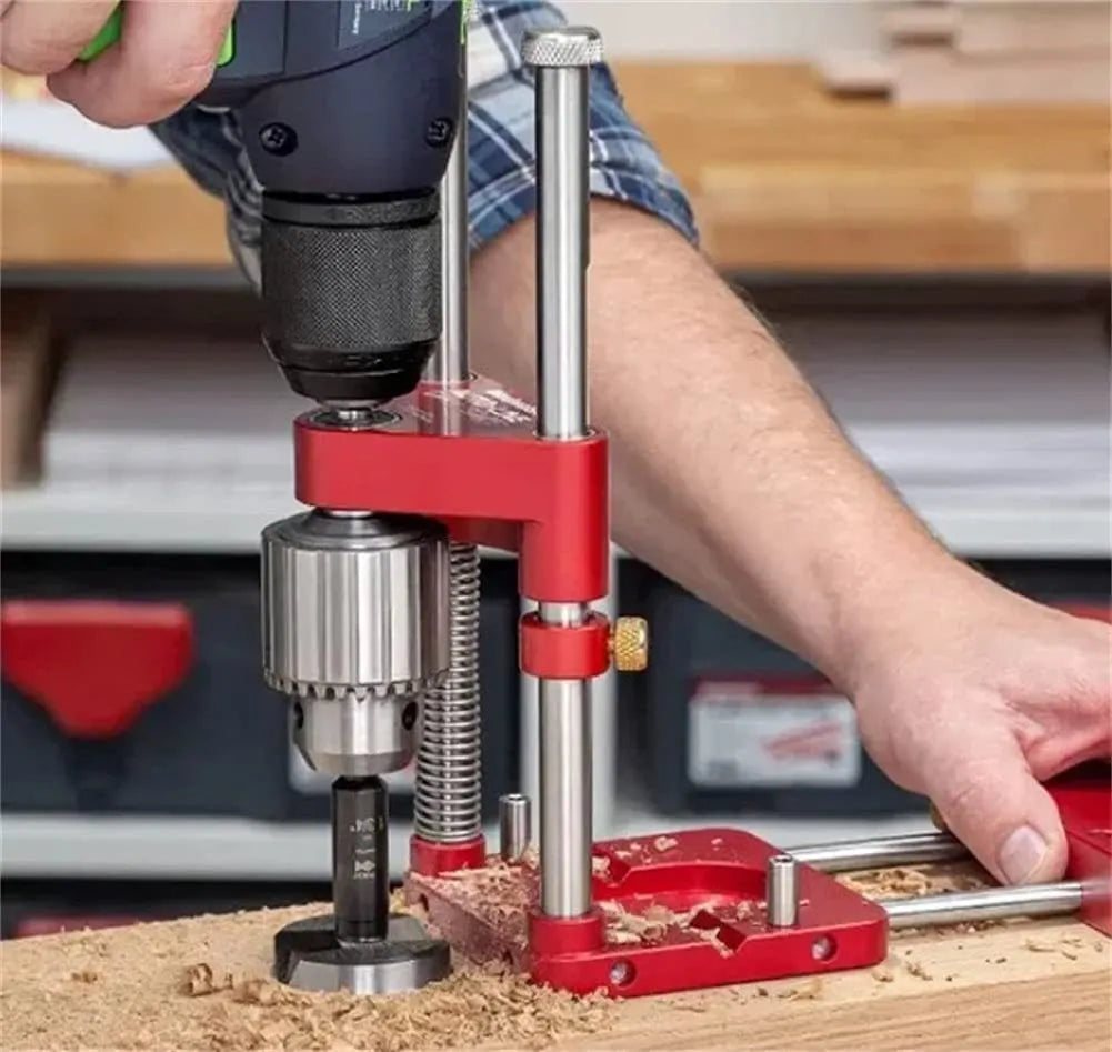 Woodworking drill locator with metal body and red or black plastic guide for drilling wood