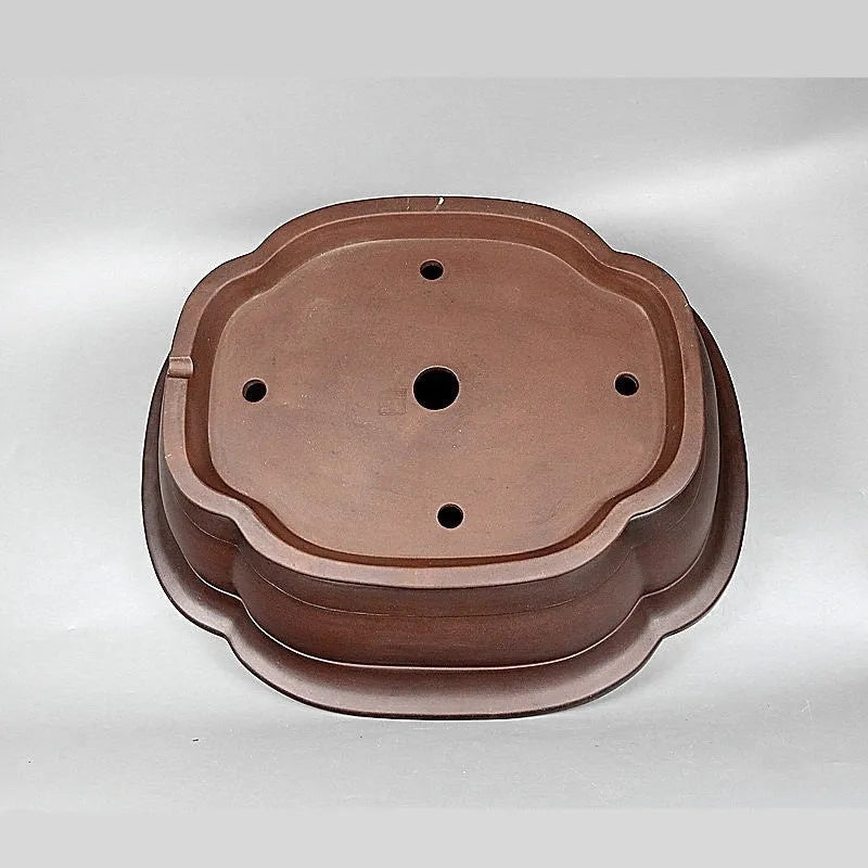 Handmade antique Chinese style purple clay flowerpot shaped like a crabapple fruit.
