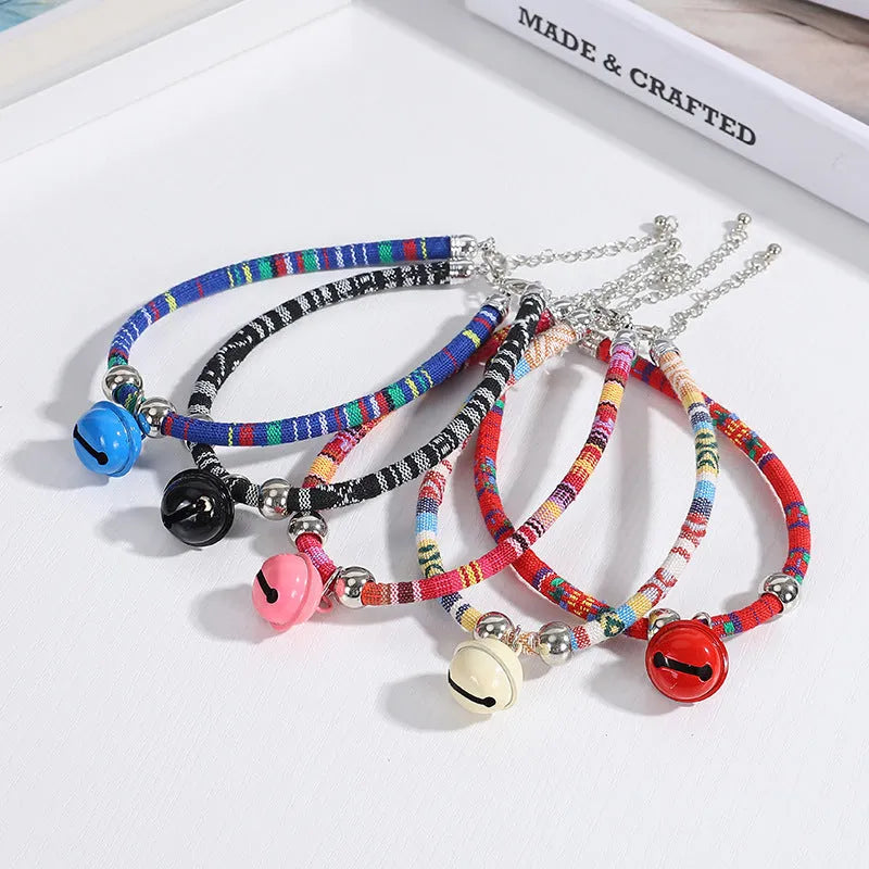Coloured ethnic floral pattern pet collar with a bell and plastic buckle for dogs and cats.