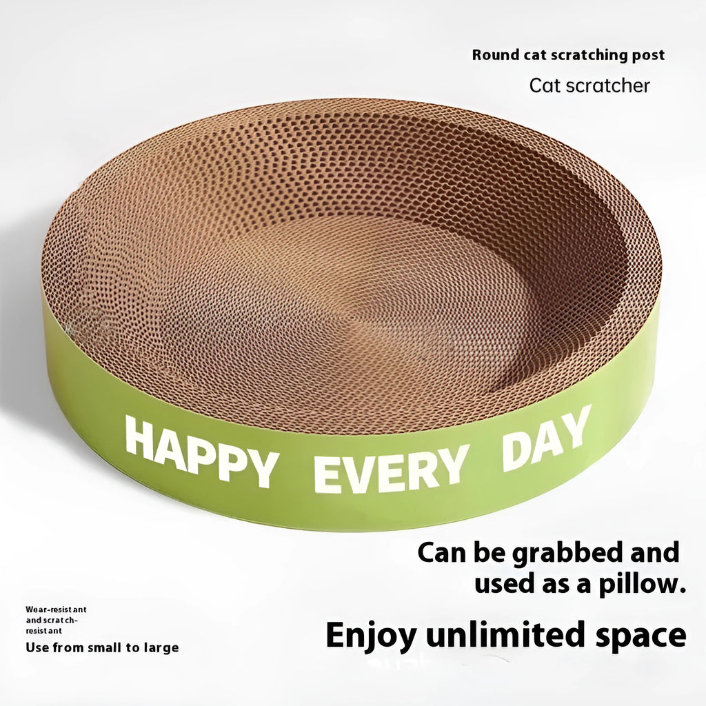 Green round cat scratching board nest bed on a floor