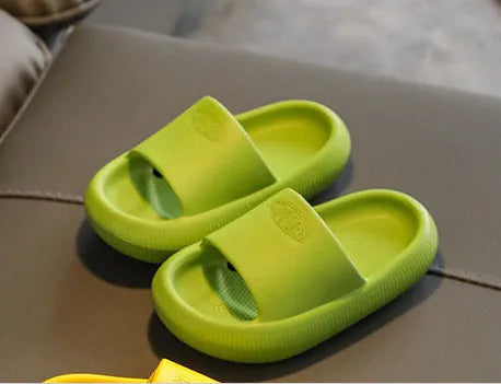 Children's mixed colour EVA slippers with a non-slip sole, shown in sizes for kids.