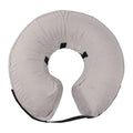 Blue inflatable dog recovery collar fastened around a dog's neck showing soft cone alternative