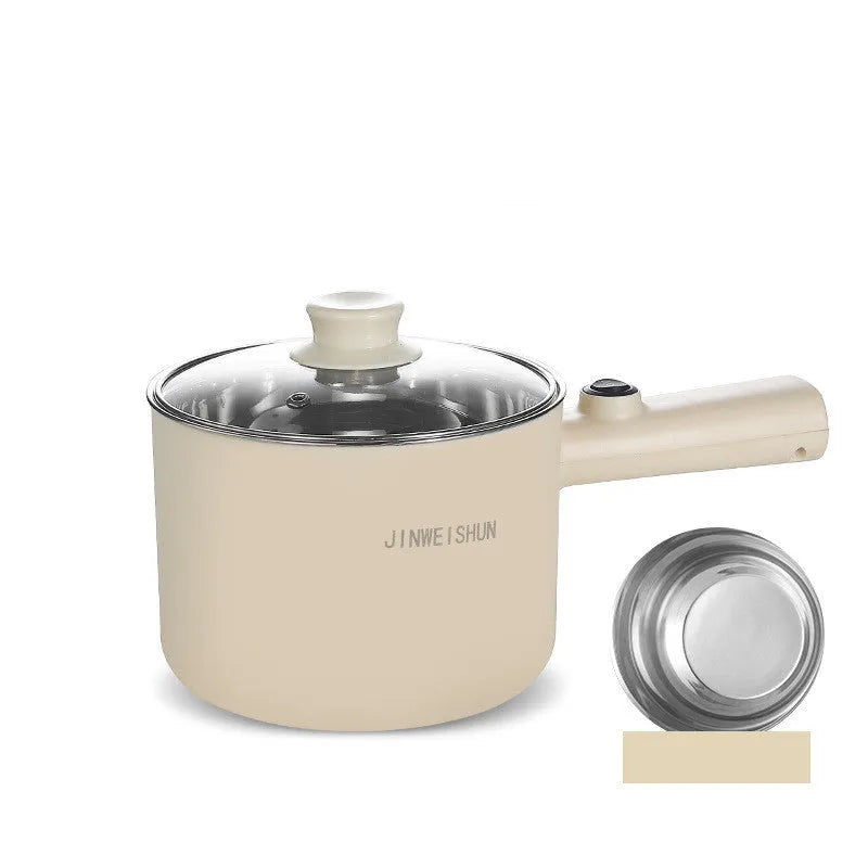 Mini electric hot pot appliance in stainless steel with non-stick coating and included cooking accessories