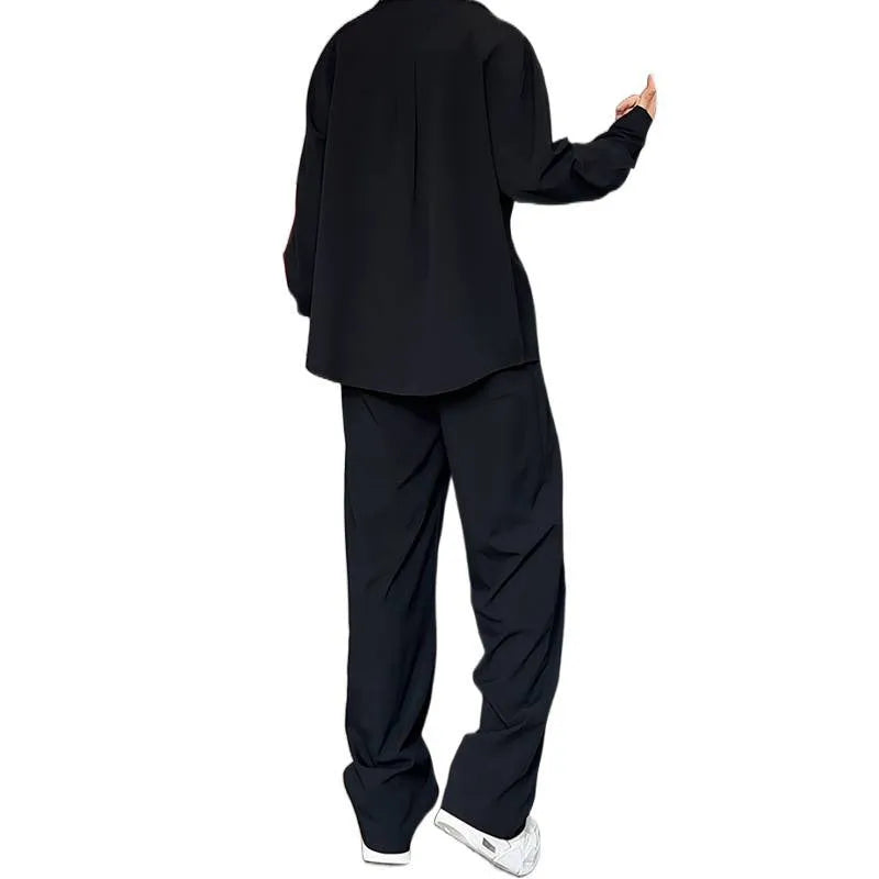 Men's black casual two-piece suit with long sleeve polo shirt and slim fit trousers
