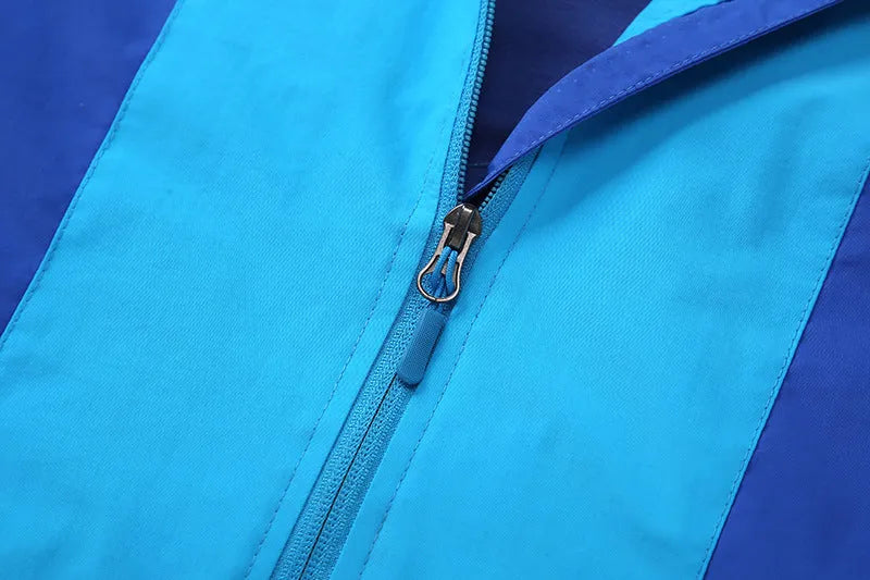Blue thin autumn jacket for boys with long sleeves and zipper closure