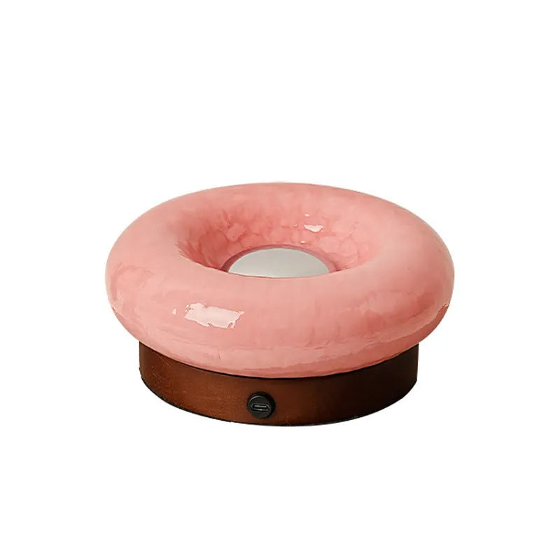 Donut-shaped rechargeable touch table lamp in custard colour with three colour temperature settings