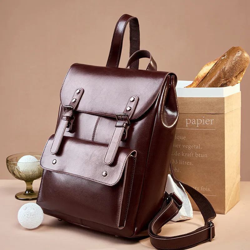 Genuine leather women's computer backpack in black, brown, or coffee brown colours.