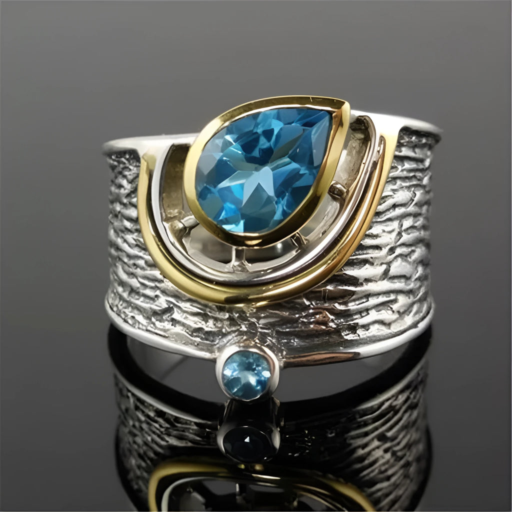 Blue Chinese style zircon ring with drop shape setting on alloy band