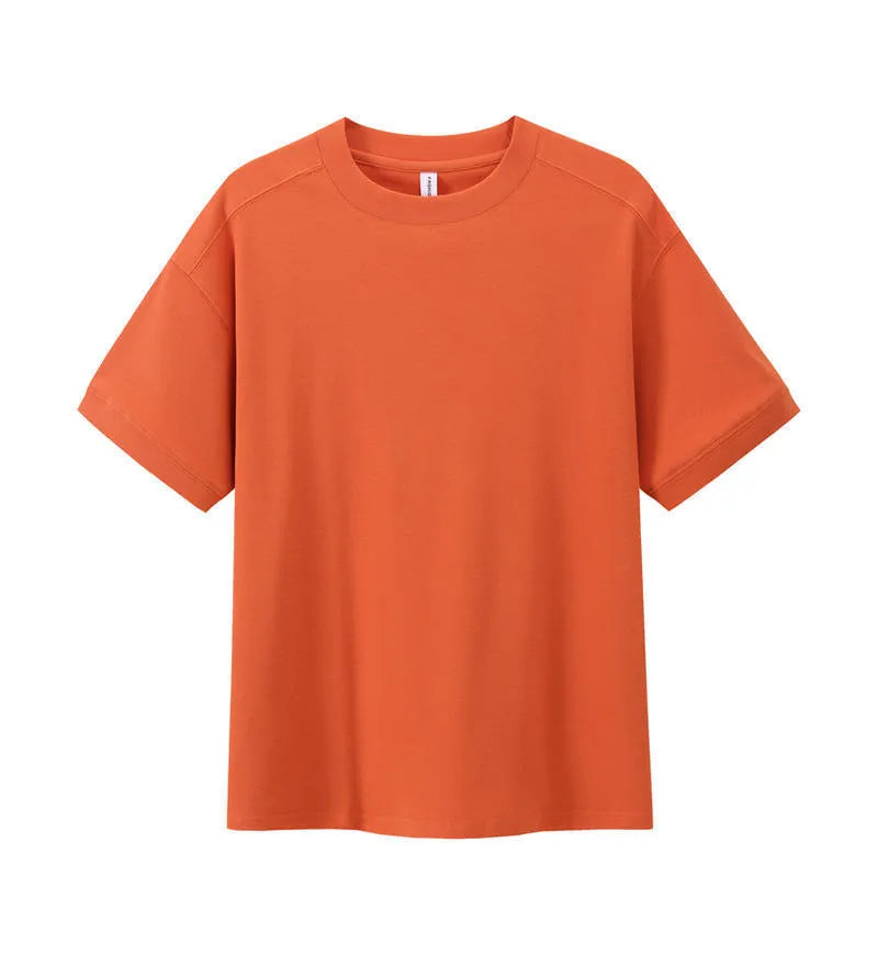 Short-sleeved loose-fit cotton pique T-shirt for youth in solid colour options