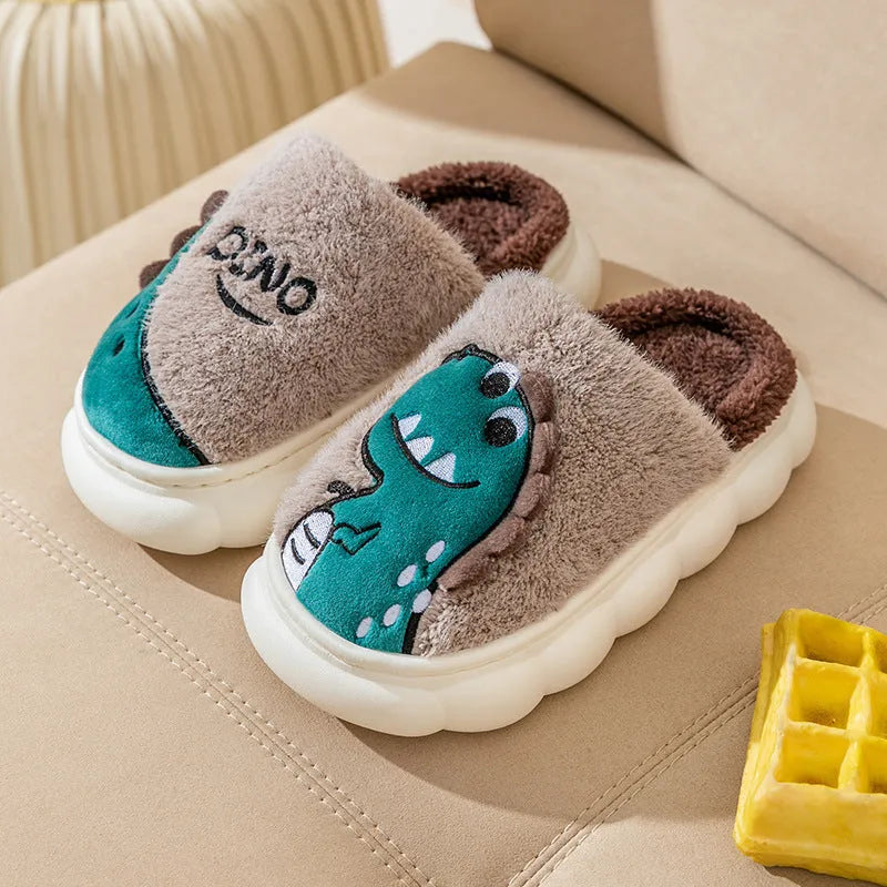 A pair of warm plush cotton slippers for couples, shown in a dinosaur-themed colour design.