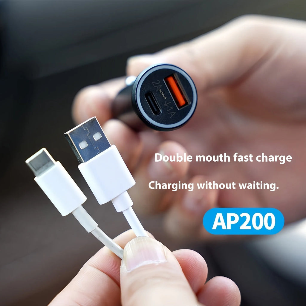 Black ABS plastic car charger locator GPS setting instrument on a dark surface.