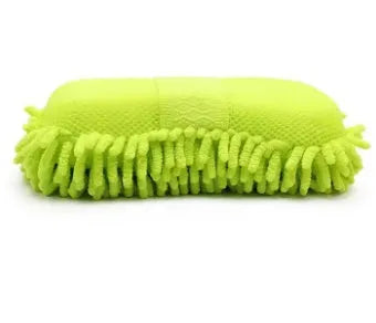Silvery green chenille microfiber car wash sponge on a car bonnet.