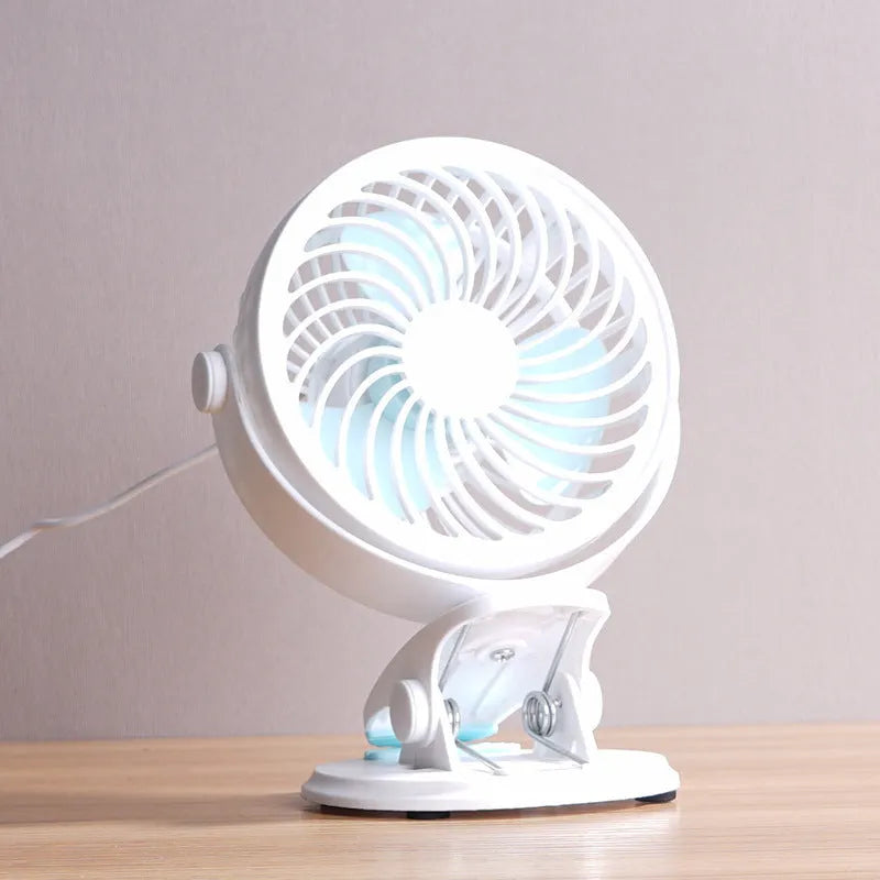 Small USB desktop fan in clip and floor standing styles showing compact size and three blades