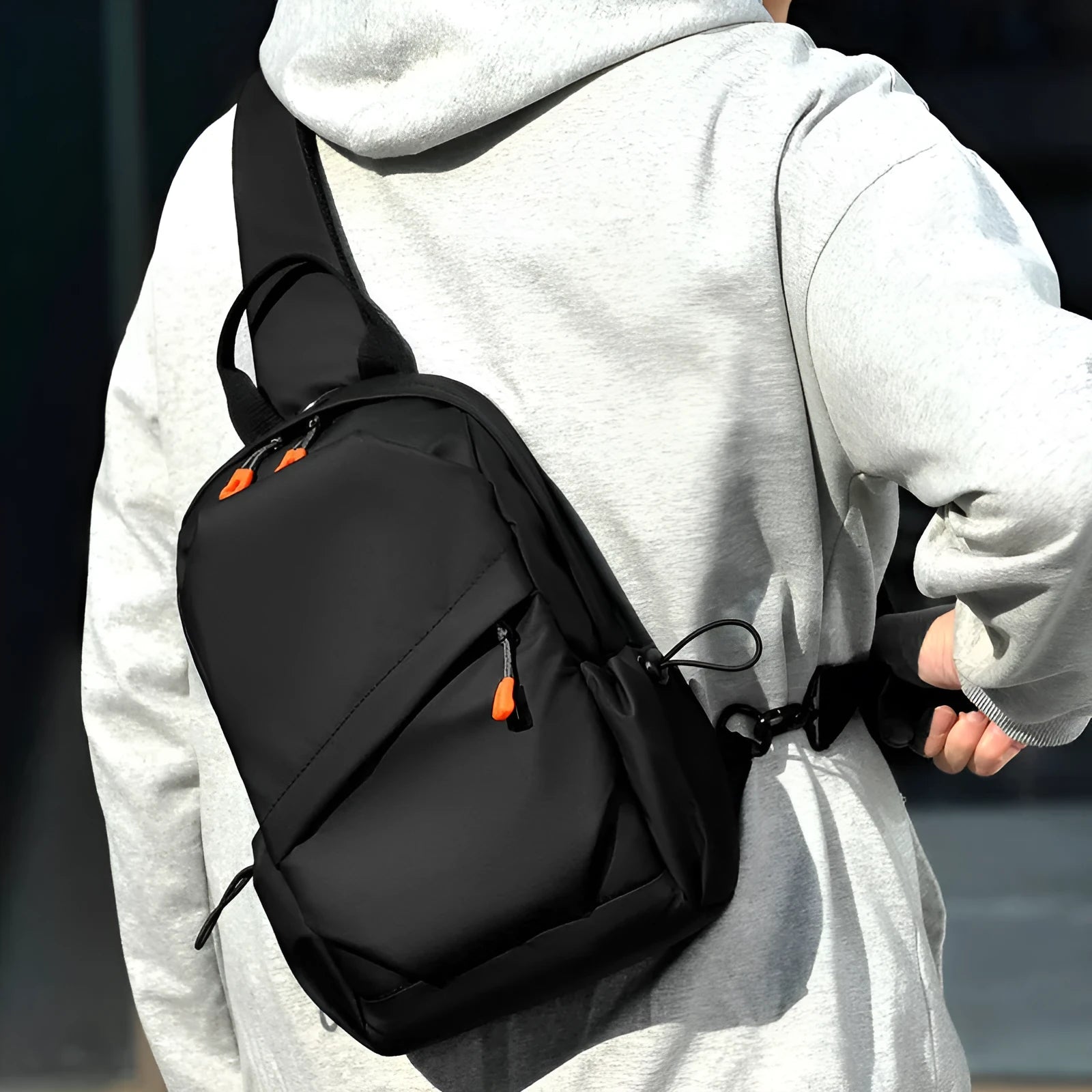 Men's black casual crossbody bag made from waterproof polyester with single shoulder strap