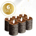 Black S6 LED pillar candle with flameless flickering light, 5 cm diameter and 7 cm tall.