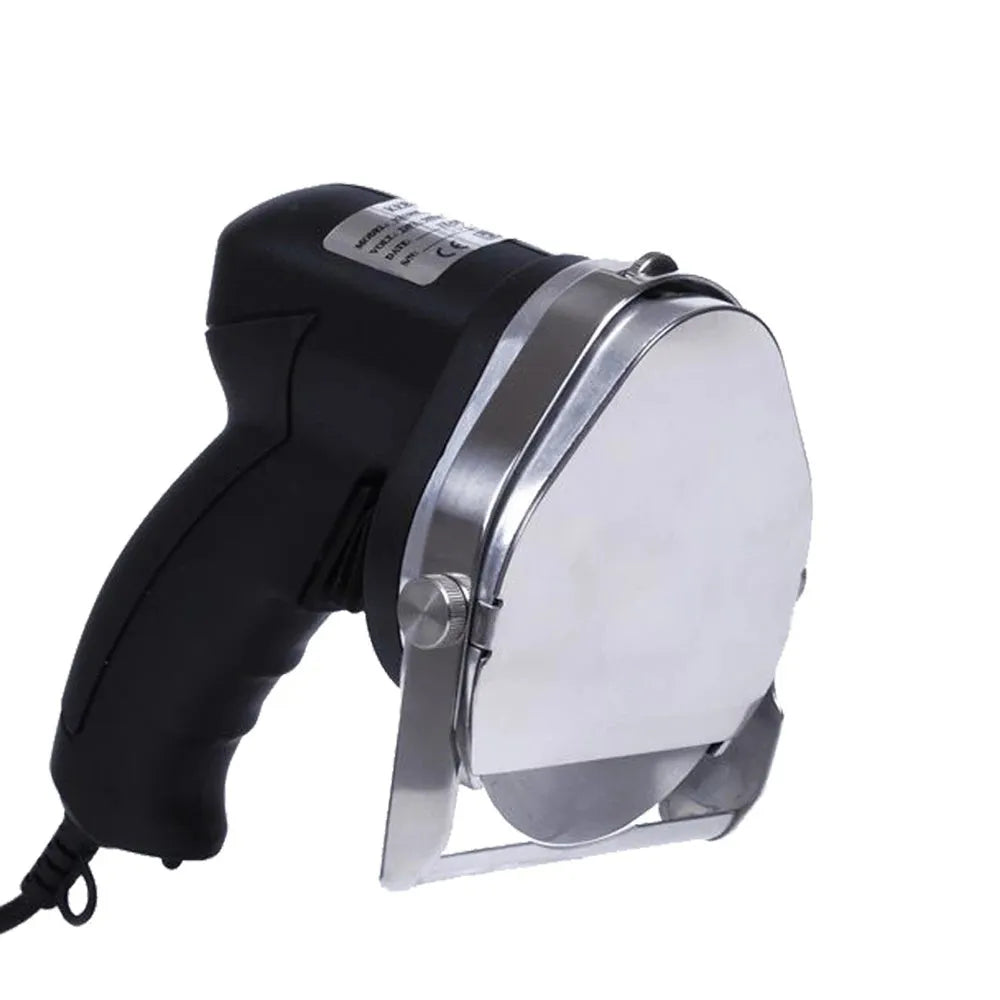 Black electric meat cleaver with power cord and EU plug for turkey barbecue preparation.
