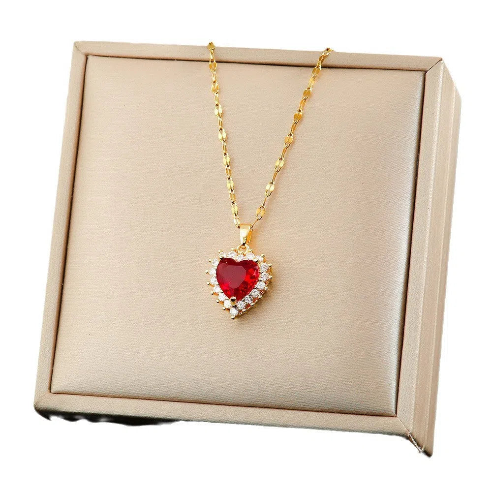 Gold red titanium steel heart pendant necklace with mixed gem inlay and water wave chain