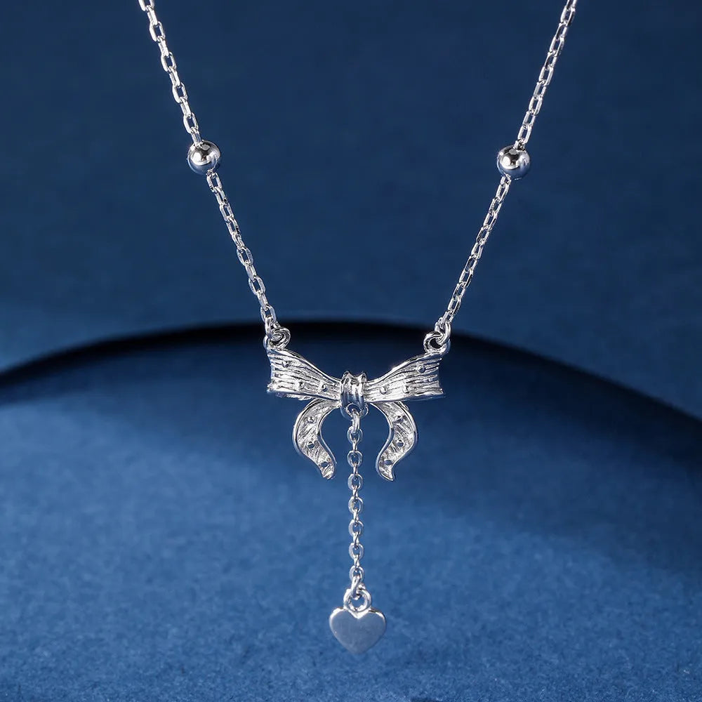 S925 silver butterfly heart clavicle chain necklace with adjustable O-ring chain and bow detailing