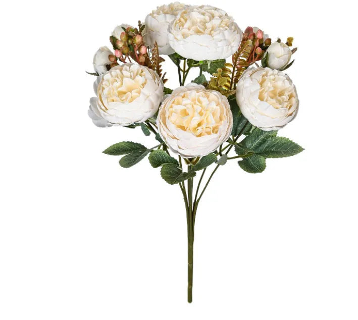 Silk artificial peony bouquet in champagne and sand red colours for home or wedding decoration.