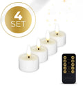 Four white plastic LED tealight candles showing size next to a ruler.