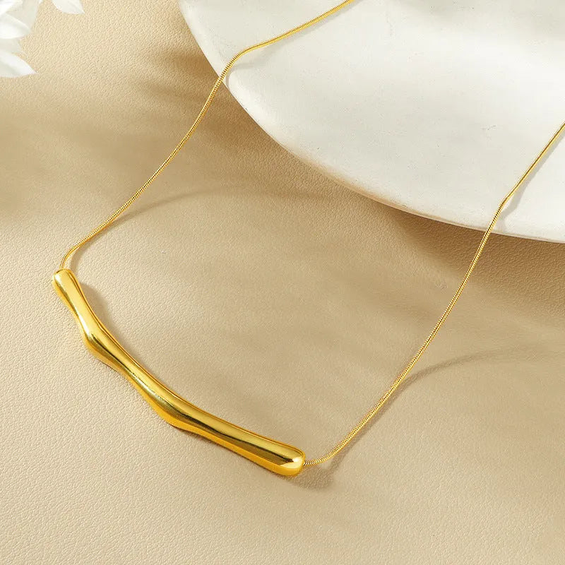 Women's titanium steel necklace with irregular pleated pendant in gold or steel electroplated finish