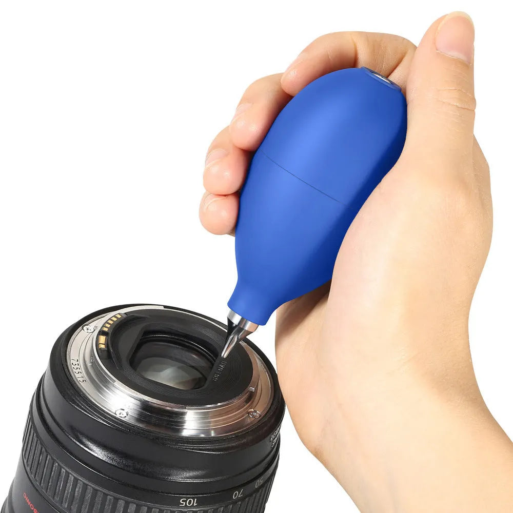 Blue and black rubber dust removal air blower cleaning tool for cameras and phones.