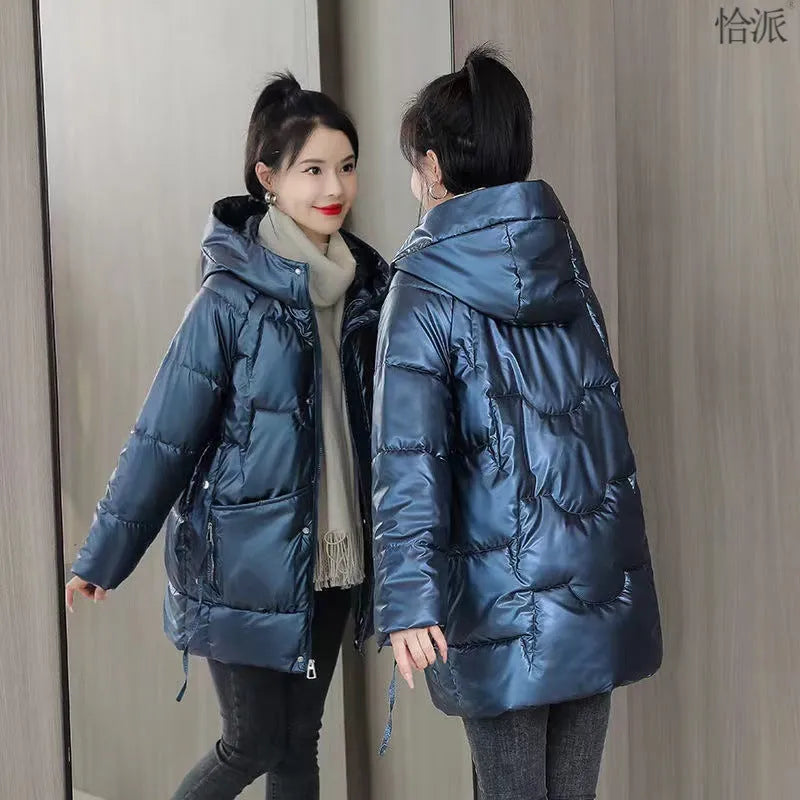 A women's loose-fit hooded winter jacket in a polyester blend, available in black, blue, green, and champagne.