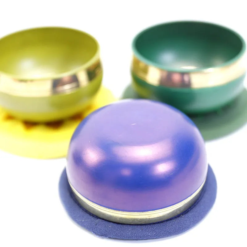 Handmade Himalayan singing bowl percussion instrument in one of seven colours, measuring 7.8cm.