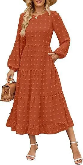 Long sleeve casual dress with round neck, high waist, and ruffle sleeves in a solid colour.