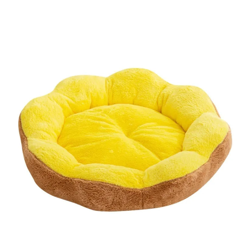 A round, thick rabbit plush cat bed in a nest shape with a detachable washable cover.
