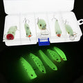 Set of five fluorescent 3D hard bait fishing lures with luminous finish on a blue background.