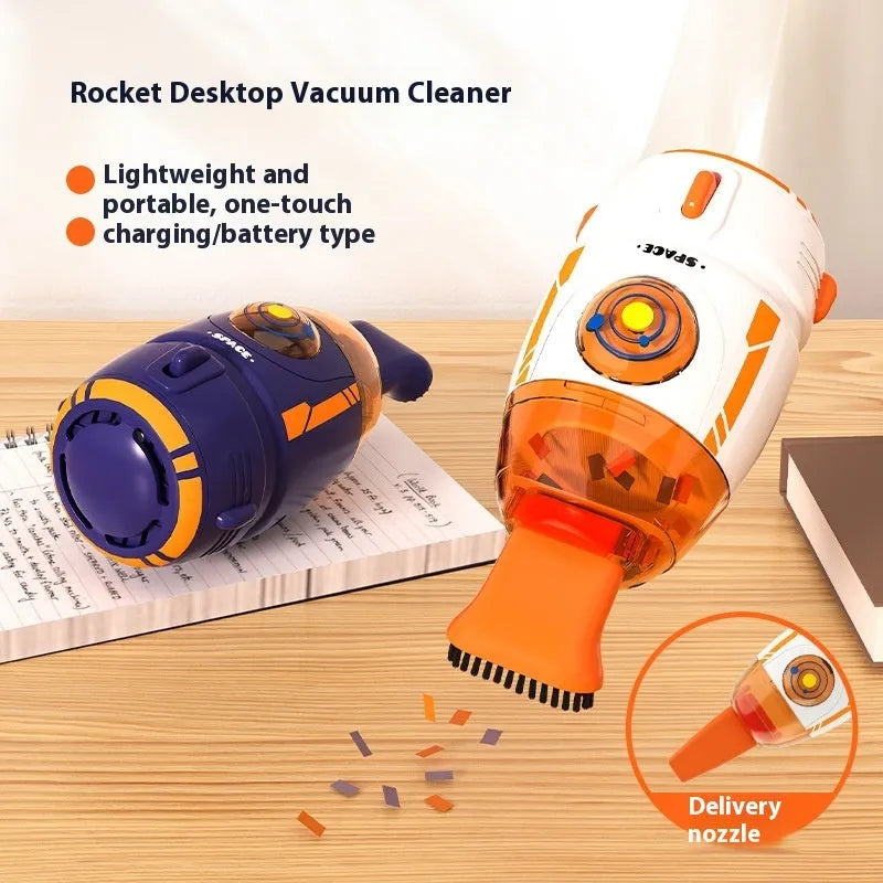 Handheld cordless desktop vacuum cleaner in blue rocket design with USB charging cable.