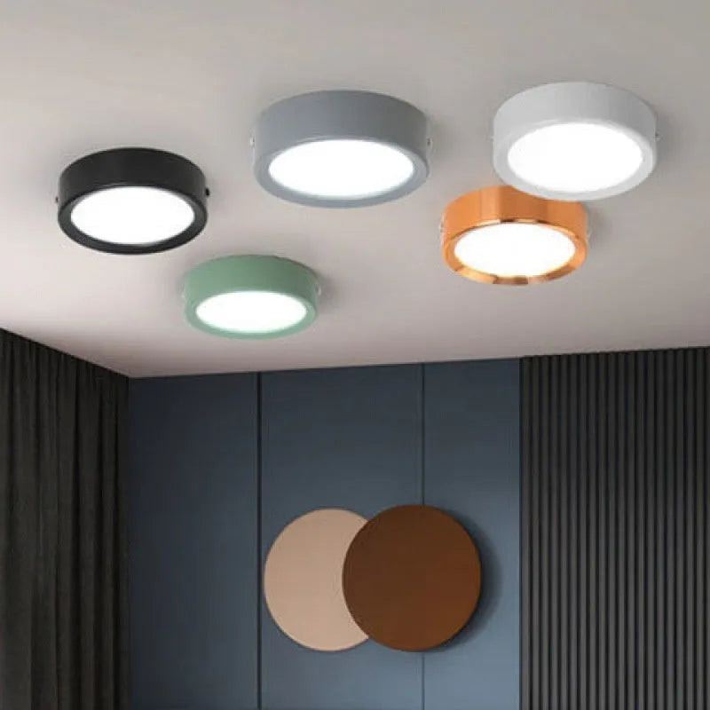 Ultra-thin surface mounted LED downlight in a choice of coloured aluminium shells.