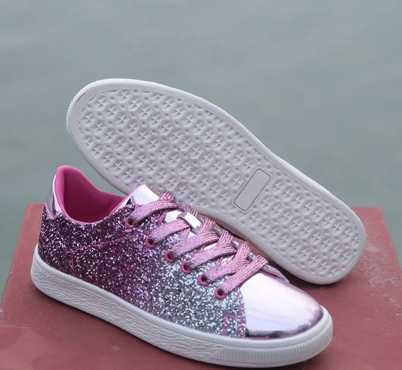 Women's black, pink, and gold sequinned casual lace-up shoes with a round toe and leather lining.