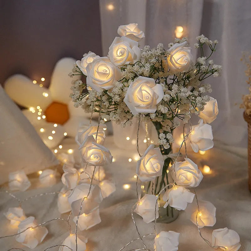 LED rose shaped coloured lights on 1.5m cable with battery power unit for indoor holiday decoration