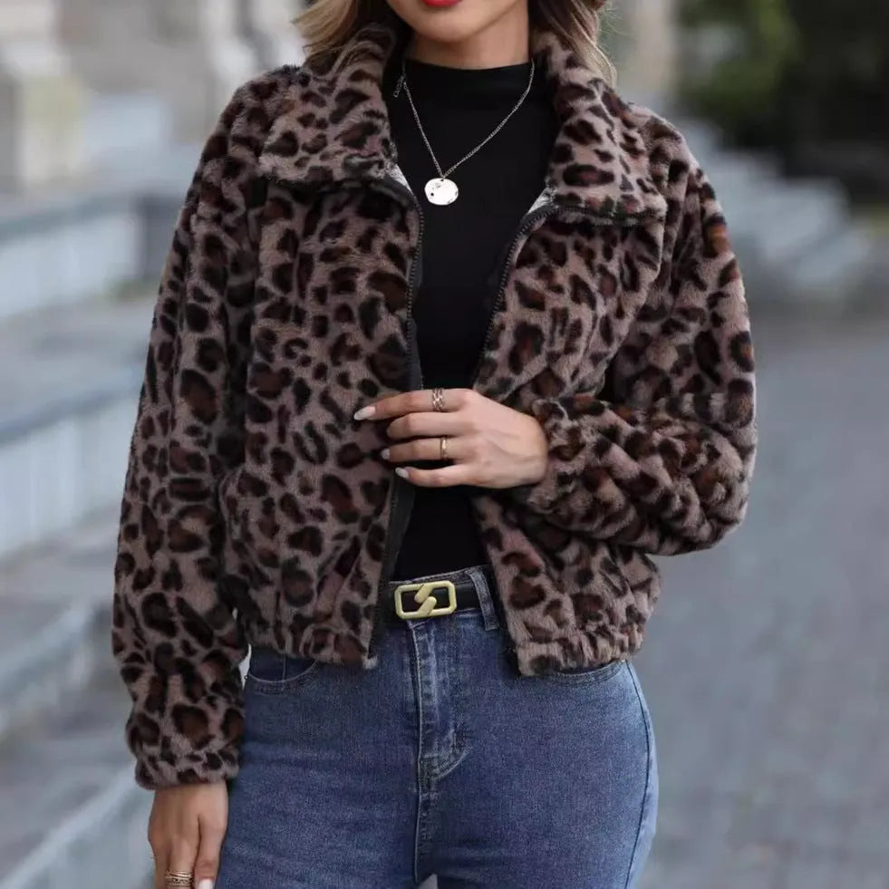 Women's loose leopard print plush coat with front zip and raglan sleeves.