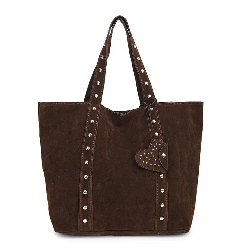Women's black PU leather tote bag with double shoulder straps showing sandwich pocket detail